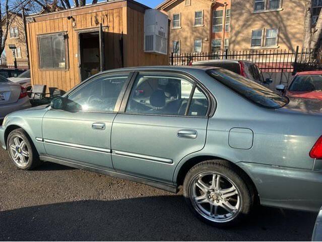 Photo of 2000 Iced Teal Pearl Honda Civic