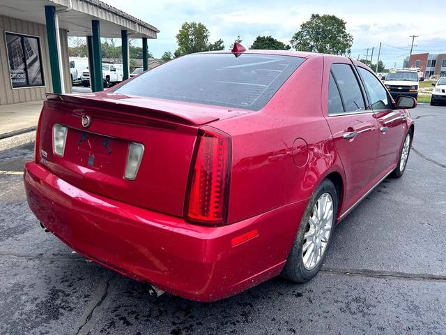 Photo of 2011 Crystal Red Tintcoat Cadillac STS