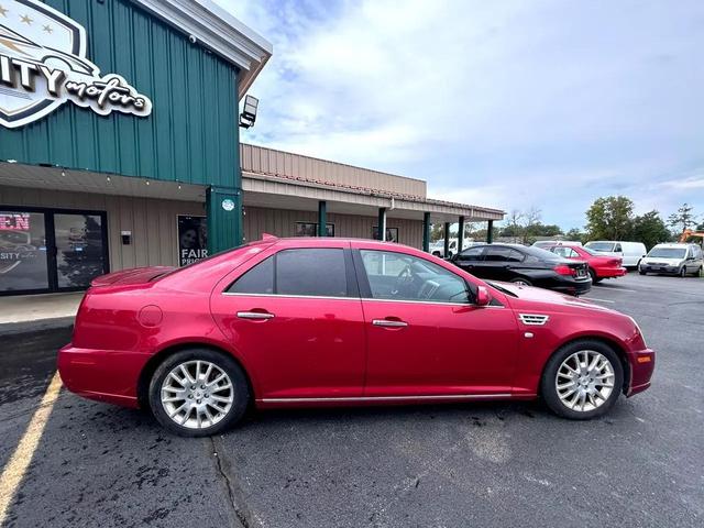 Photo of 2011 Crystal Red Tintcoat Cadillac STS