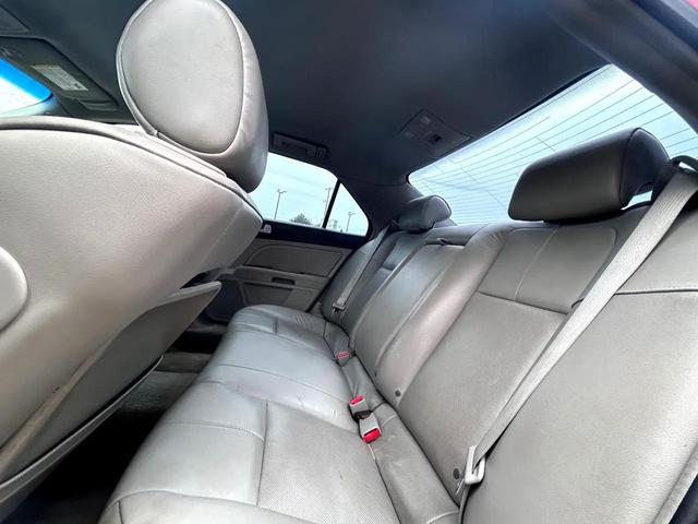 Photo of 2011 Crystal Red Tintcoat Cadillac STS