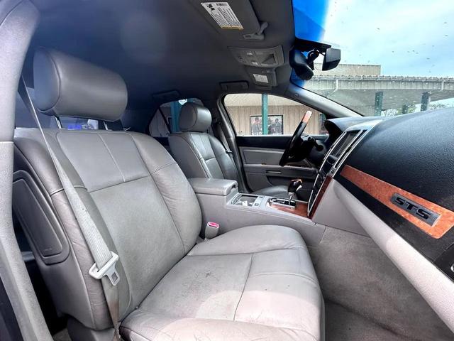 Photo of 2011 Crystal Red Tintcoat Cadillac STS