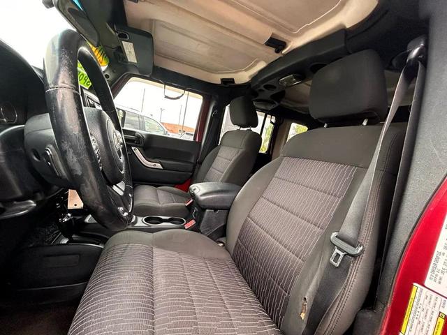 Photo of 2012 Burgundy Jeep Wrangler Unlimited