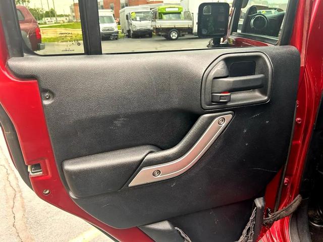 Photo of 2012 Burgundy Jeep Wrangler Unlimited