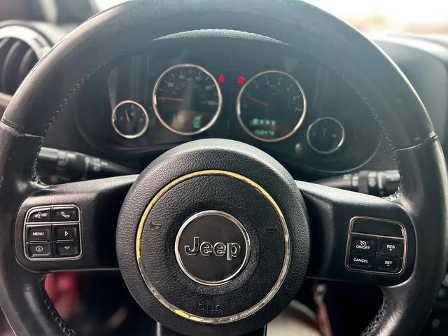 Photo of 2012 Burgundy Jeep Wrangler Unlimited