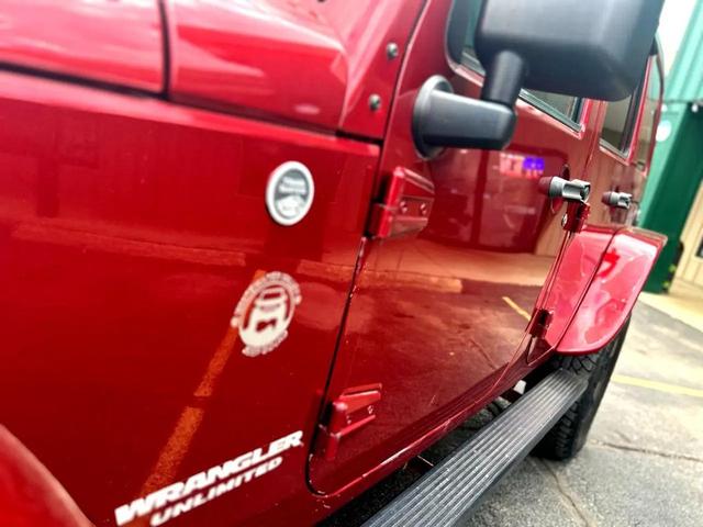 Photo of 2012 Burgundy Jeep Wrangler Unlimited