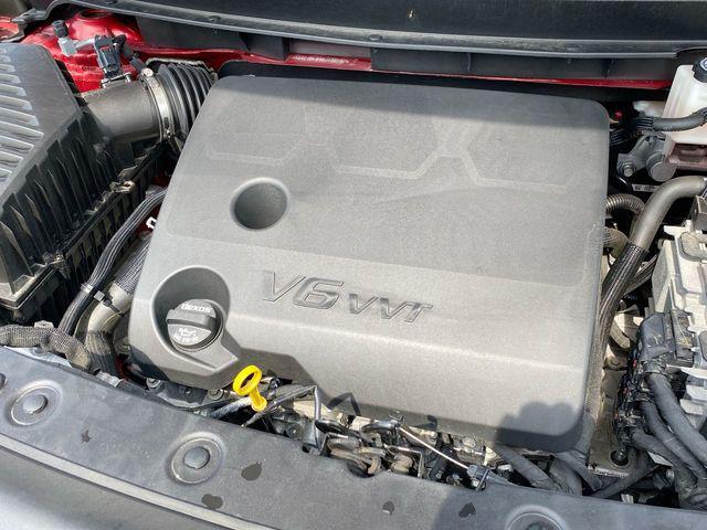 Photo of 2024 Cherry Red Tintcoat Buick Enclave