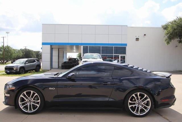 Photo of 2021 Black Ford Mustang