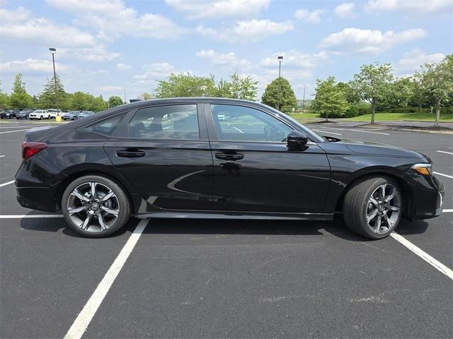 Photo of 2025 Crystal Black Pearl Honda Civic Hybrid