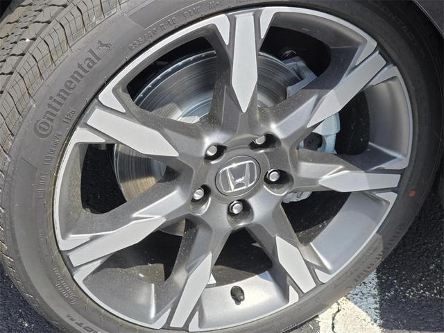 Photo of 2025 Crystal Black Pearl Honda Civic Hybrid