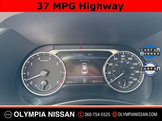 Photo of 2023 Monarch Orange Metallic/Super Black Nissan Sentra