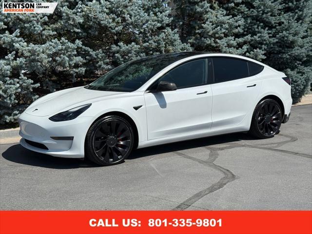 Photo of 2022 Pearl White Multi-Coat Tesla Model 3
