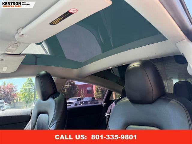 Photo of 2022 Pearl White Multi-Coat Tesla Model 3