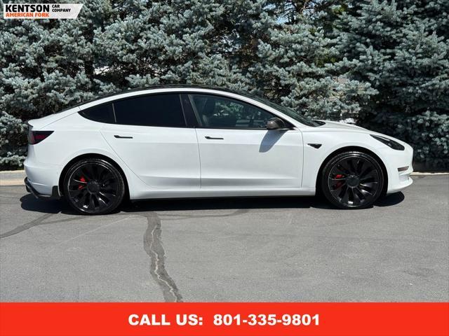 Photo of 2022 Pearl White Multi-Coat Tesla Model 3