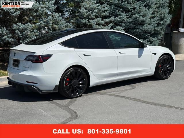 Photo of 2022 Pearl White Multi-Coat Tesla Model 3
