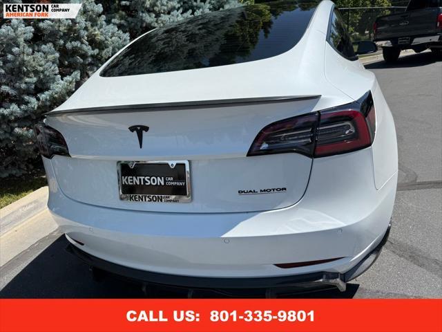 Photo of 2022 Pearl White Multi-Coat Tesla Model 3