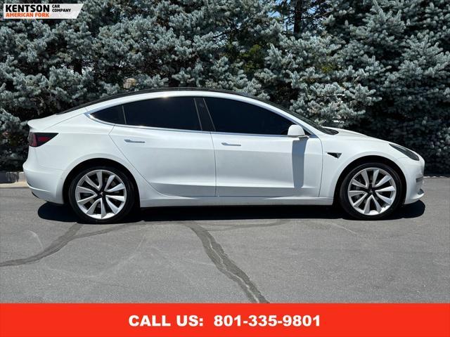 Photo of 2020 Pearl White Multi-Coat Tesla Model 3