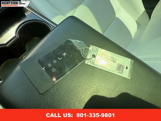 Photo of 2020 Pearl White Multi-Coat Tesla Model 3