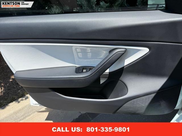 Photo of 2020 Pearl White Multi-Coat Tesla Model 3