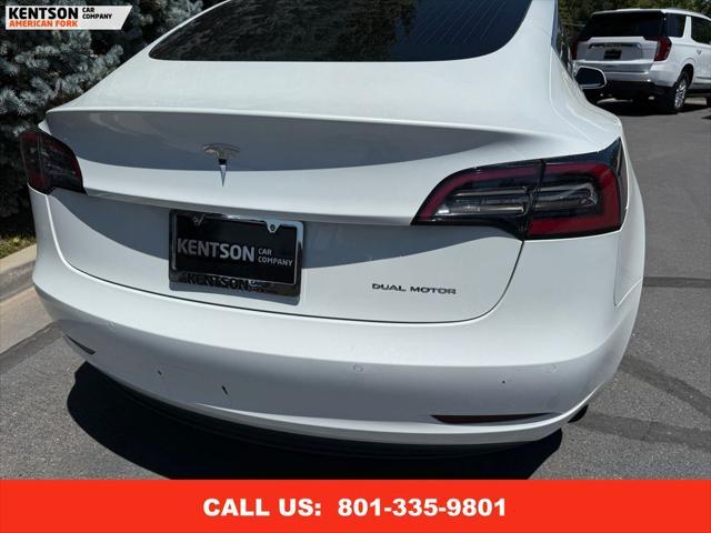Photo of 2020 Pearl White Multi-Coat Tesla Model 3