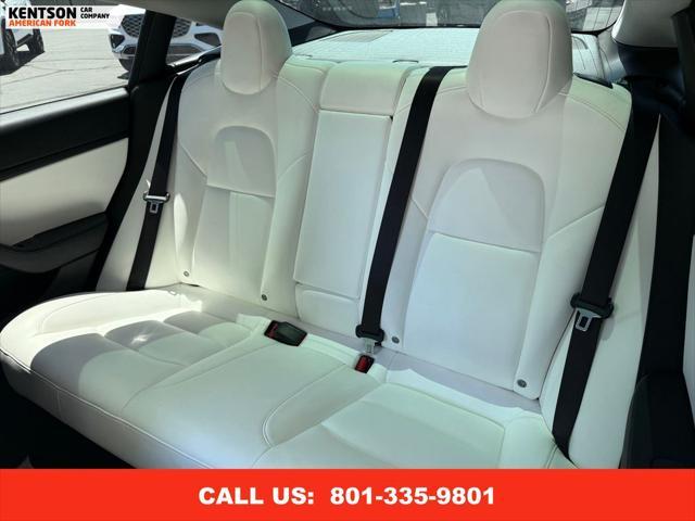 Photo of 2020 Pearl White Multi-Coat Tesla Model 3