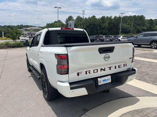 Photo of 2023 Glacier White Nissan Frontier