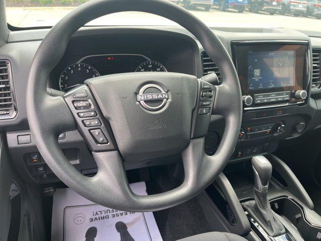 Photo of 2023 Glacier White Nissan Frontier