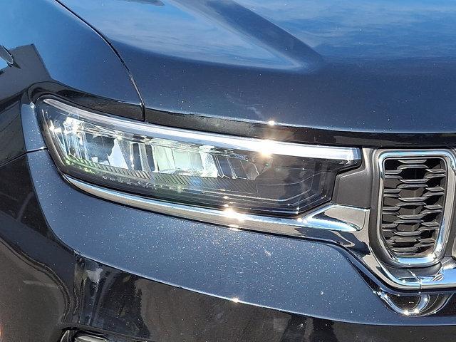 Photo of 2024 Diamond Black Crystal Pearlcoat Jeep Grand Cherokee