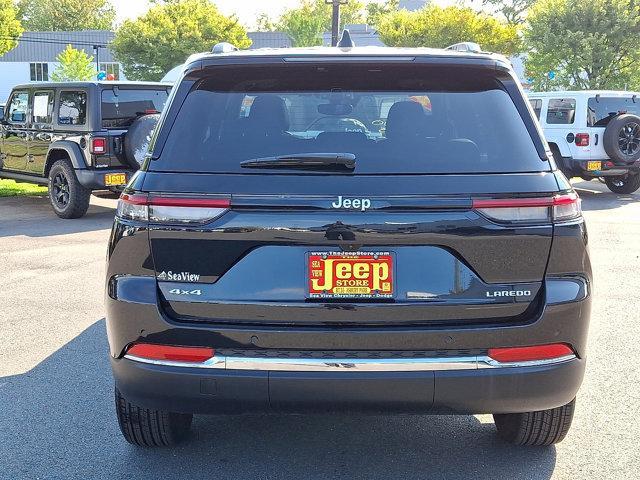 Photo of 2024 Diamond Black Crystal Pearlcoat Jeep Grand Cherokee