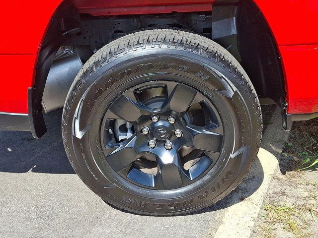 Photo of 2025 Flame Red Clearcoat RAM 1500