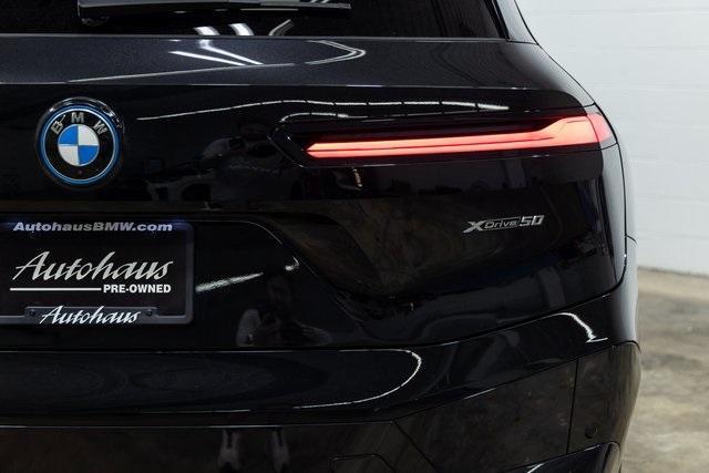 Photo of 2025 Black Sapphire Metallic BMW iX