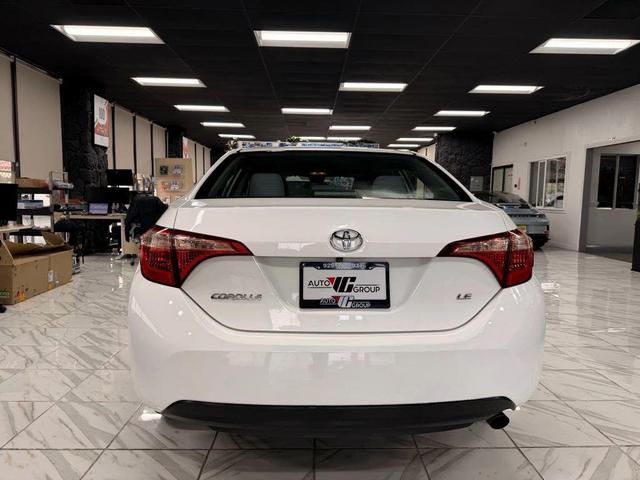 Photo of 2017 Super White Toyota Corolla