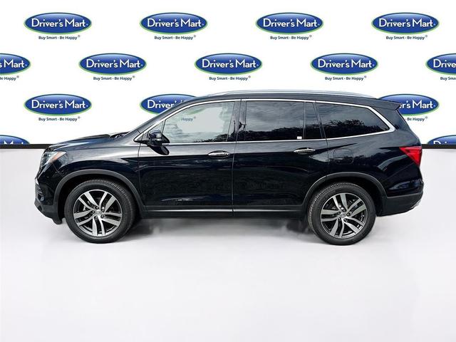 Photo of 2016 Crystal Black Pearl Honda Pilot