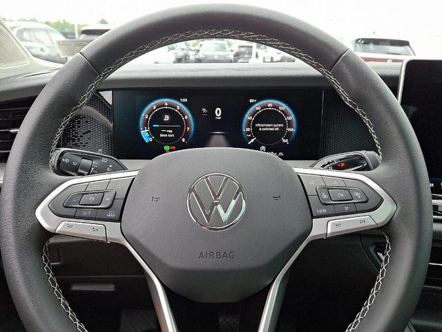 Photo of 2025 Monterey Blue Pearl Volkswagen Tiguan
