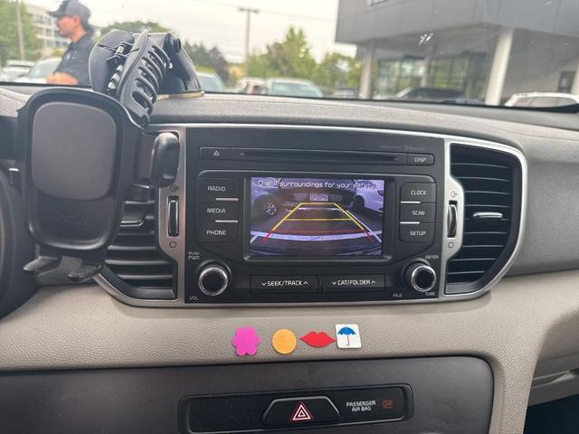 Photo of 2017 Pacific Blue Kia Sportage