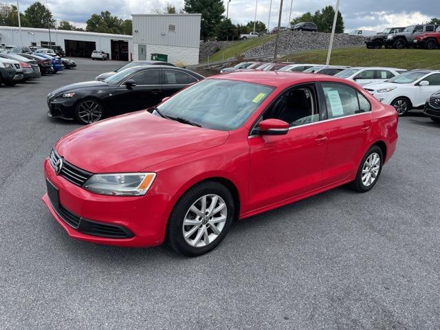 Photo of 2013 Tornado Red Volkswagen Jetta