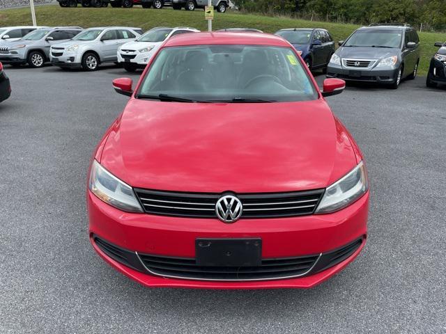 Photo of 2013 Tornado Red Volkswagen Jetta