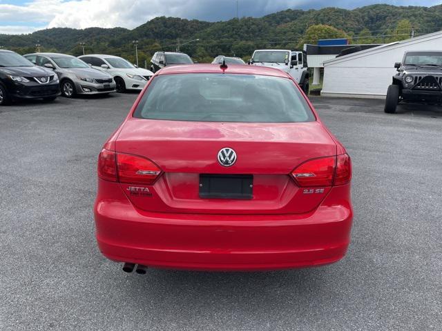 Photo of 2013 Tornado Red Volkswagen Jetta