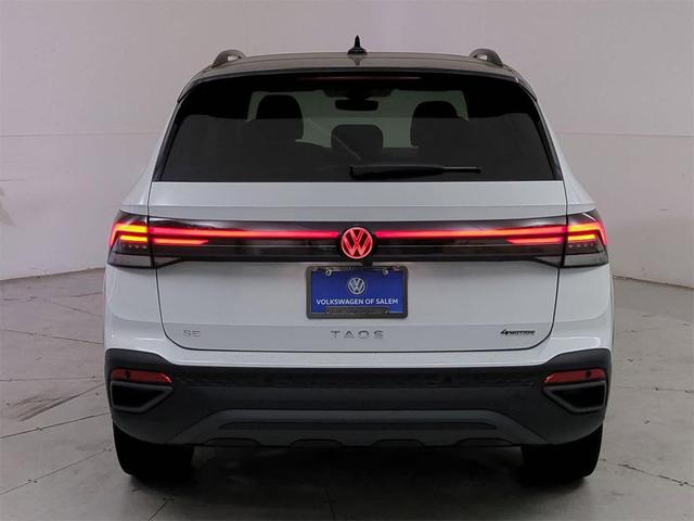 Photo of 2025 Pure White w/Deep Black Roof Volkswagen Taos