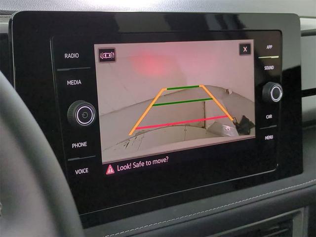 Photo of 2025 Pure White w/Deep Black Roof Volkswagen Taos