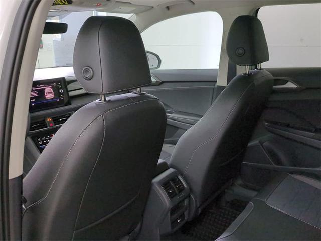 Photo of 2025 Pure White w/Deep Black Roof Volkswagen Taos