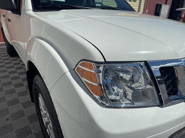 Photo of 2021 Glacier White Nissan Frontier