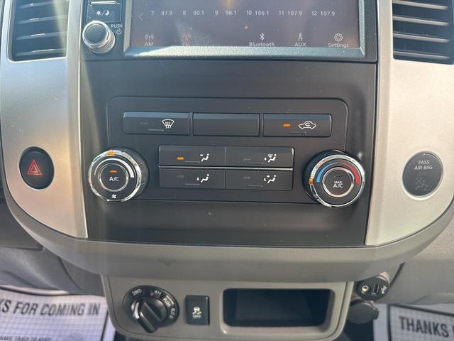 Photo of 2021 Glacier White Nissan Frontier