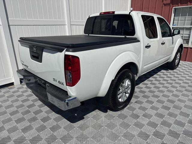 Photo of 2021 Glacier White Nissan Frontier