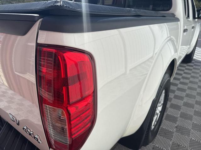 Photo of 2021 Glacier White Nissan Frontier