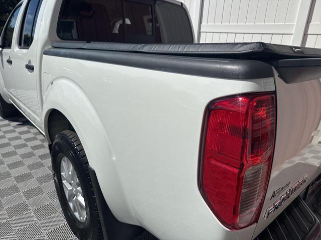 Photo of 2021 Glacier White Nissan Frontier