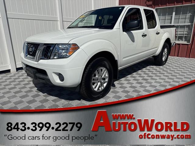 Photo of 2021 Glacier White Nissan Frontier