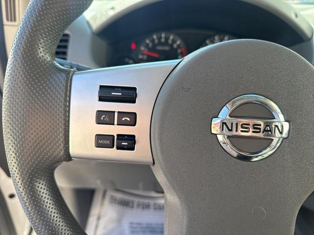 Photo of 2021 Glacier White Nissan Frontier