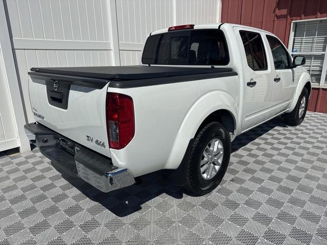 Photo of 2021 Glacier White Nissan Frontier