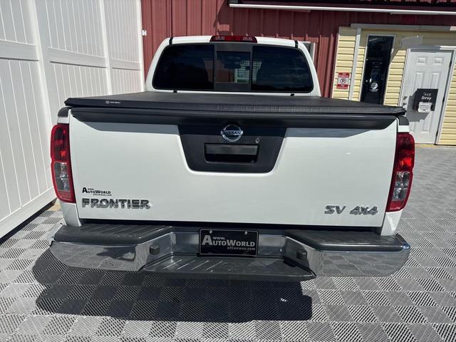 Photo of 2021 Glacier White Nissan Frontier