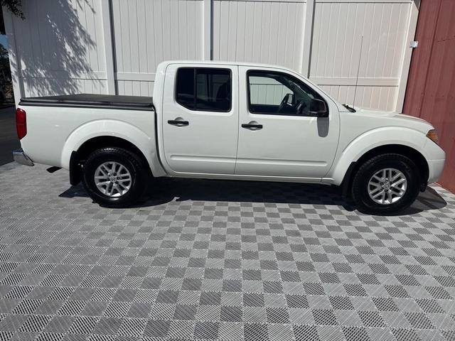 Photo of 2021 Glacier White Nissan Frontier